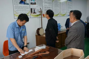 上海市企業(yè)聯(lián)合會副會長兼秘書長蔣蘇平蒞臨上海民族樂器一廠考察調(diào)研